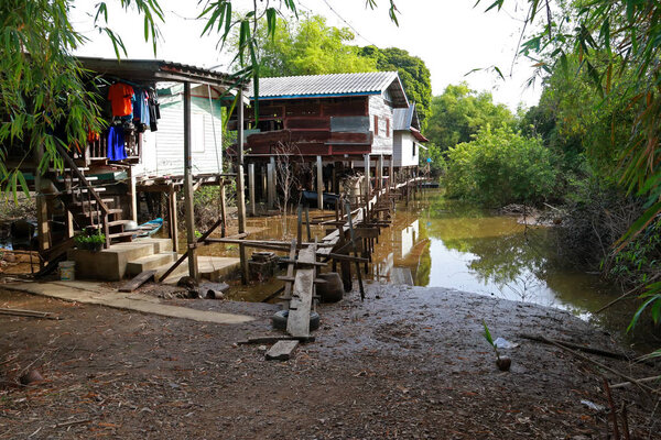 wooden house flooded, old rural house in water