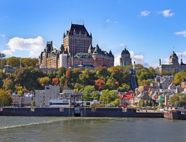 Autumn in Old Town Quebec City. View from Saint Lawrence River with famous hotel Frontenac. clipart