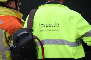 Çevre ve Hollanda Ulaştırma muayene Müfettiş arkası.