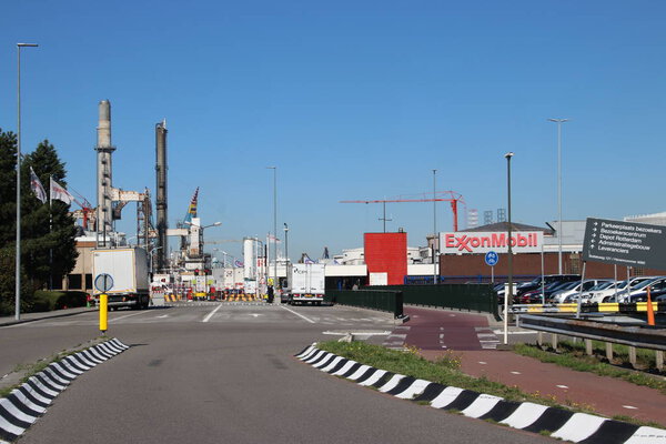 Entrance of the ExxonMobile plant with Tanks and pipes in the chemical industries in the Botlek Harbor in Rotterdam in the Netherlands