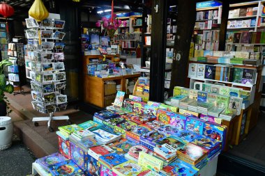 Ho Chi Minh City, Saigon, Socialist Republic of Vietnam - august 16 2018 : the book shop street near the post office clipart
