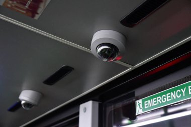 London; England - november 24 2018 : security camera in an interior of a bus clipart
