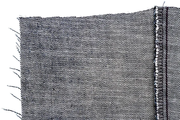 Stuk Van Zwarte Jeans Stof Geïsoleerd Een Witte Achtergrond Ruwe — Stockfoto