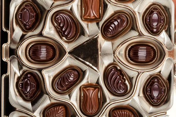 Close up shot of chocolate candies in a box