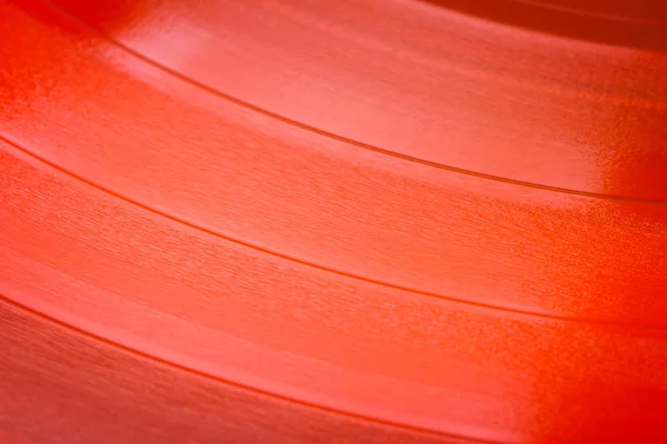 Gros plan de la surface de vinyle rouge — Photo