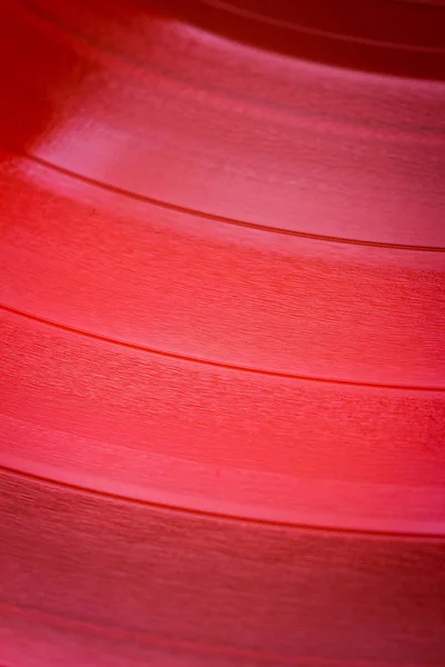 Primer plano de la superficie de vinilo rojo — Foto de Stock