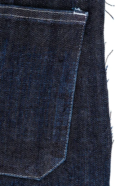 Stuk van blue jeans stof — Stockfoto