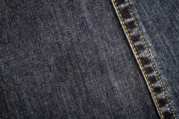 Текстура чёрных джинсов — стоковое фото