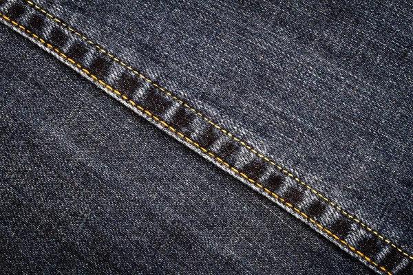 Текстура чёрных джинсов — стоковое фото