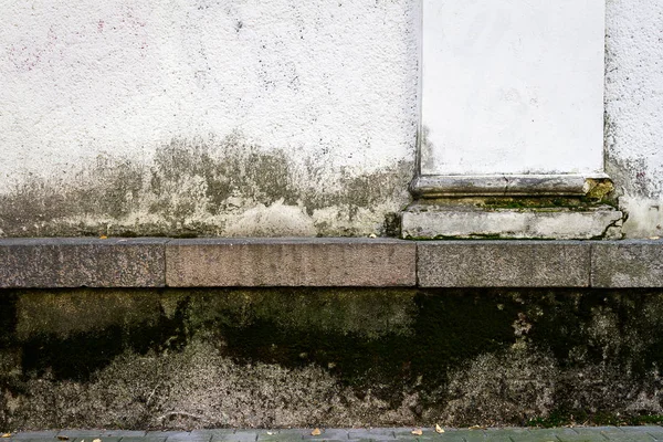 Oude gepleisterde straat muur — Stockfoto