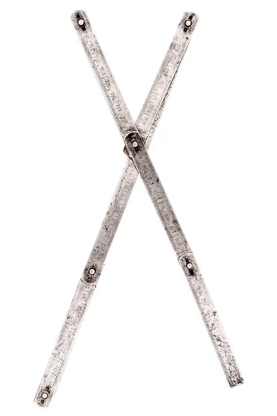 Velho medidor de ferro letra régua X — Fotografia de Stock
