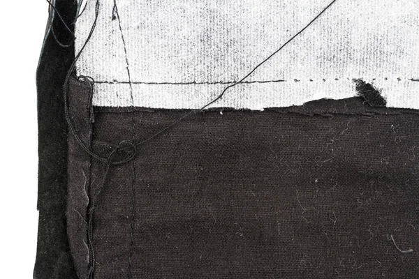 一片凌乱的黑色皮革隔离在白色背景上 折皱的材料质感 — 图库照片