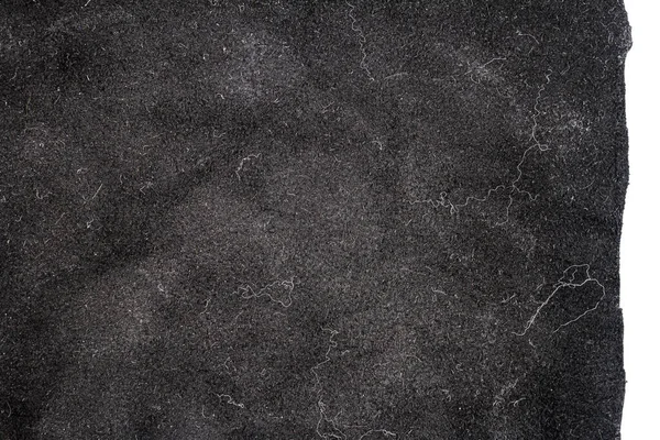白い背景に隔離された厄介な黒い革のピース 砕いた素材の質感 — ストック写真