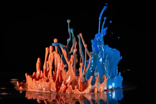 Colorido Splashing Tintas Fundo Preto — Fotografia de Stock
