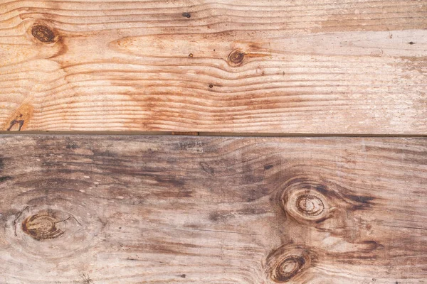 Vintage Wood Background Texture. Natural brown barn wood floor / wall texture background pattern. Wood planks / boards are very old with a beautiful rustic look / style.