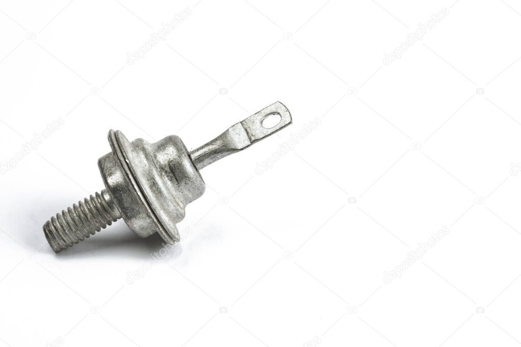 Radio element, a very old diode close-up, on a white background