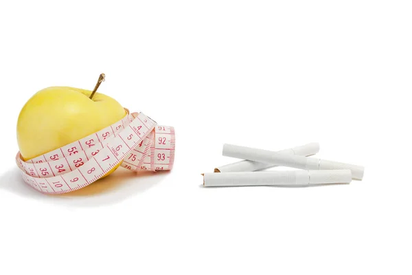 Healthy Lifestyle Concept Measuring Tape Yellow Apple Cigarettes White Background — Stock Photo, Image