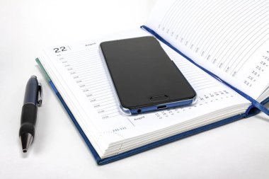 Otomatik kalem haftalık yanında olduğunu. Smartphone, yalan üzerine haftalık, izole değil