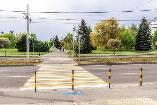 Zebra crosswalk across the road in a big city. — Stock Photo, Image