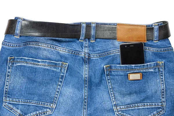 Jeans in der Tasche ist ein Handy. — Stockfoto