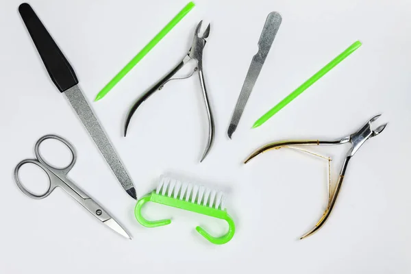 Manicure and pedicure tools on a white background. — Stock Photo, Image