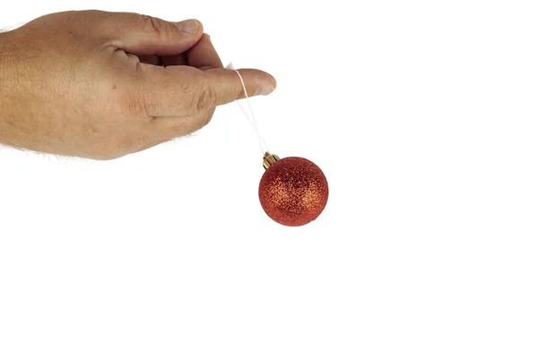 Різдвяний м'яч в руці ізольований на білому тлі . — стокове фото