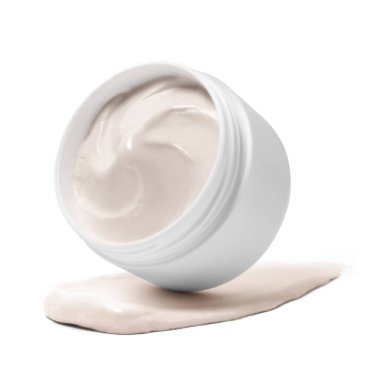 Beyaz arka planda izole edilmiş beyaz plastik kozmetik kavanozu. Seçici Odaklanma.