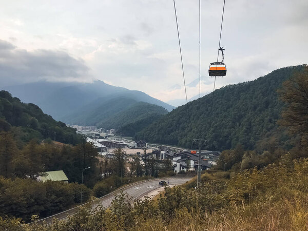 Mountain road and ��able car in Roza Khutor