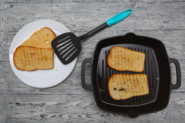 toasted bread toast on wooden background