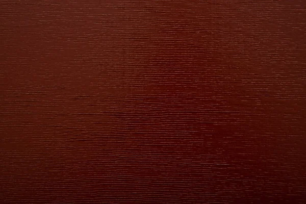 The pine Board is painted in brown color, the wood texture shines through