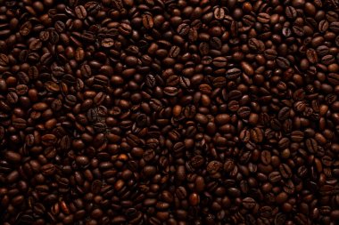 Kavrulmuş kahve çekirdekleri. Arka plan olarak kullanılabilir.