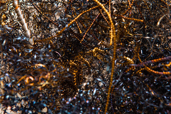 Twisted spirals of metal shavings. Abstract background