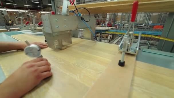 Manufacturing of a parquet board. Automated machinery equipment. — Stock Footage Manufacturing Parquet Board Automated Machinery Equipment Royalty Free Stock Video