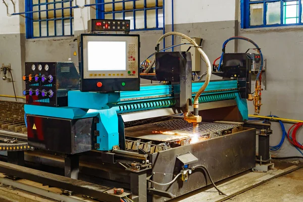 Laser machine metallurgical works to cutting metal indoors room. Industrial equipment for cutting metal.