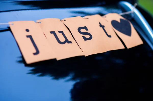 Beautiful wedding car with plate JUST. Wedding day — Stock Photo, Image