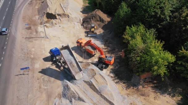 Excavator Loads Rubble Truck Large Truck Scattering Small Broken Stone — Stock Video
