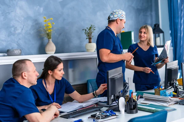 Portrait Doctors Scrubs Background Medical Office Doctors Discussion — Stock Photo, Image