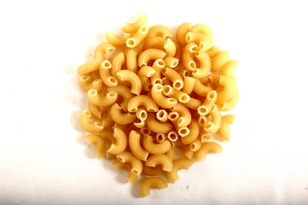 Bowl of uncooked elbow macaroni pasta — Stock Photo, Image