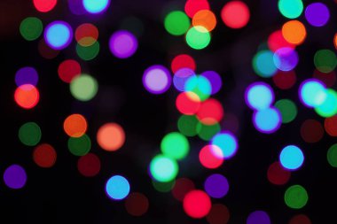 Bulanık Festival ışık siyah arka plan yok. Yeni yıl için renkli bokeh zemin