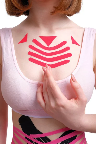 stock image Kinesio tape on the chest and belly of a young girl.