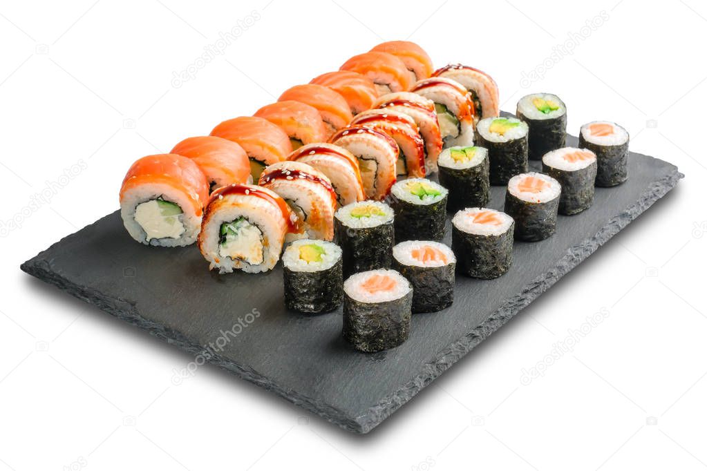 Set Sushi Rolls with eel, salmon, avocado, cucumber, nori leaves and Cream Cheese inside isolated on white background