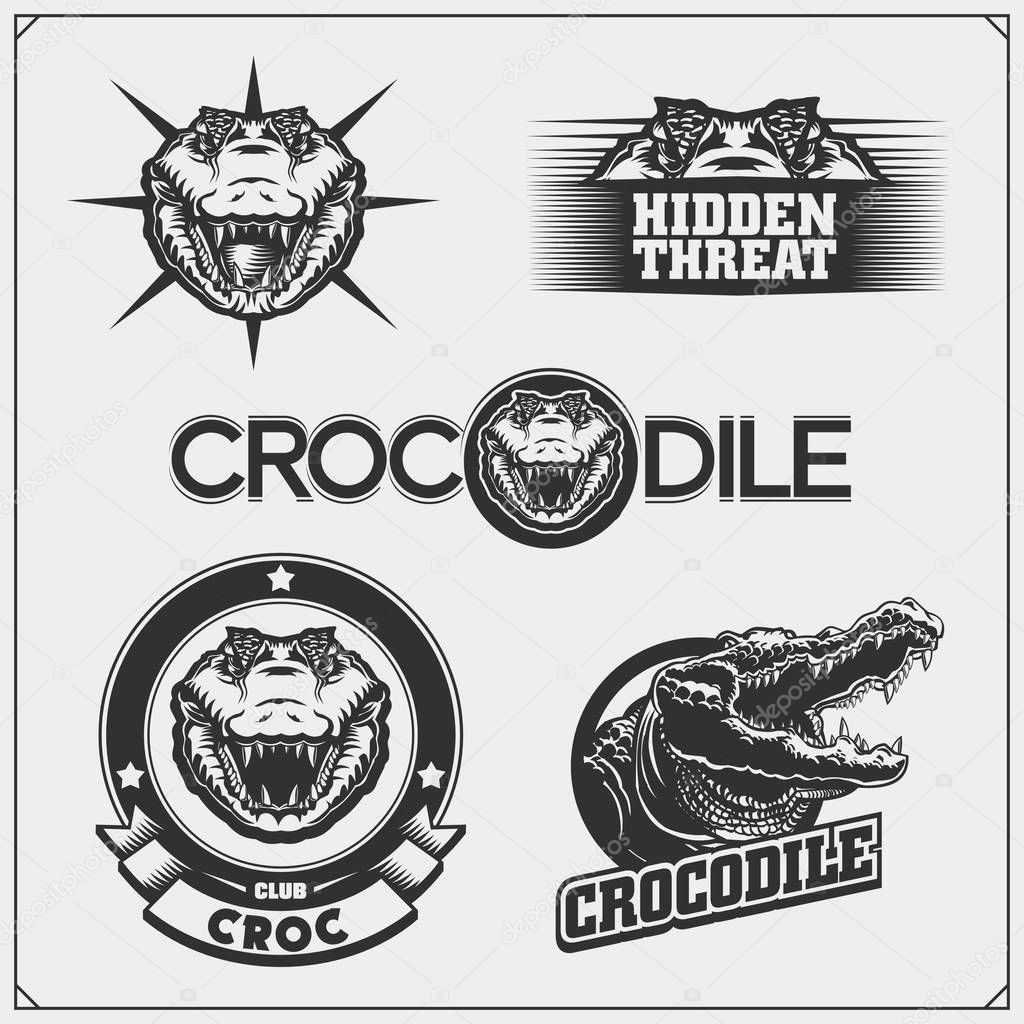 The emblems with crocodile for a sport team. Crocodile labels, badges and design elements.