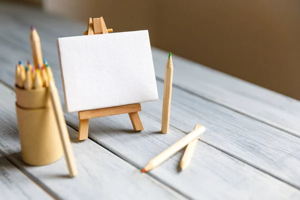 Artist workplace : White table of an artist with art tools for drawing — Stock Photo, Image