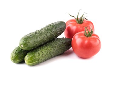 Organik sebze ve meyve. Avokado ve beyaz bir arka plan domates