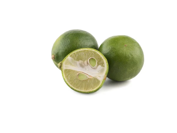 Organic vegetables and fruits. Avocados and tomatoes on a white background — Stock Photo, Image