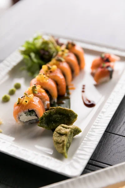 Rainbow Sushi Roll.Sushi menu. Japanese food. Top view of assorted sushi — Stock Photo, Image