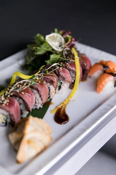 Rainbow Sushi Roll.Sushi menu. Japanese food. Top view of assorted sushi — Stock Photo, Image