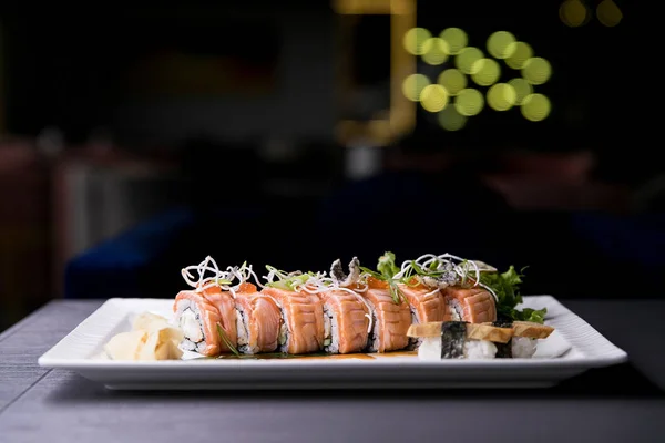 Rainbow Sushi Roll.Sushi menu. Japanese food. Top view of assorted sushi — Stock Photo, Image