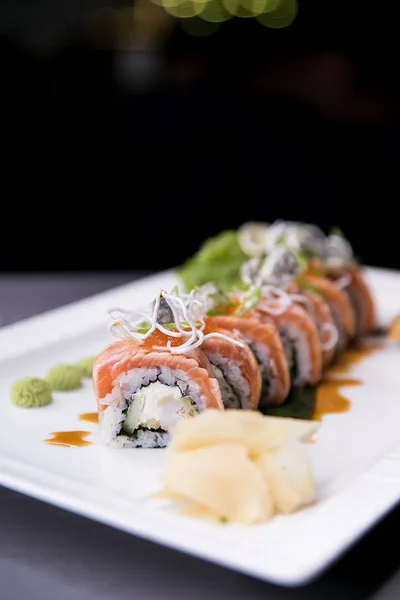 Rainbow Sushi Roll.Sushi menu. Japanese food. Top view of assorted sushi