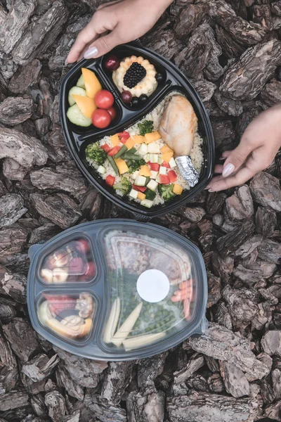 Collection of take away foil boxes with healthy food.n of take away foil boxes with healthy food.Healthy food in box. Fresh box . lifestyle, day meal plan